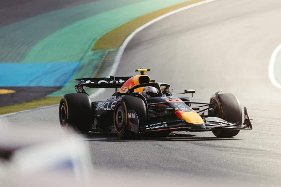 Action-packed Formula 1 racecar driving at Interlagos in São Paulo, Brazil.